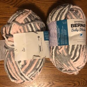 2 skeins Bernat baby blanket in baby grays